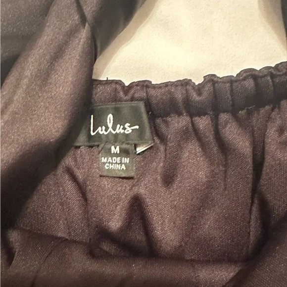 Lulus Alluring Mood Black Satin Halter Side-Tie Skort Romper - Picture 3 of 5